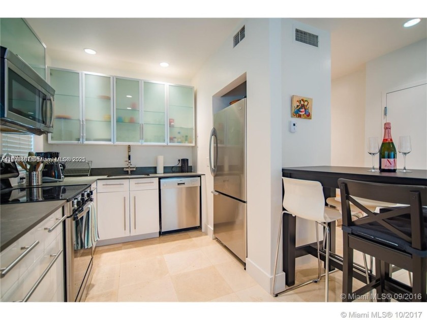 Filled with natural light, this 1st-floor corner unit features - Beach Condo for sale in Miami Beach, Florida on Beachhouse.com