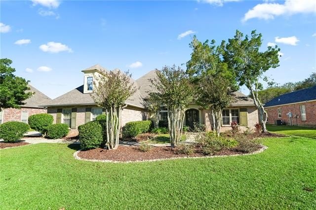 Welcome home to a commuter's dream in the highly sought after - Beach Home for sale in Mandeville, Louisiana on Beachhouse.com