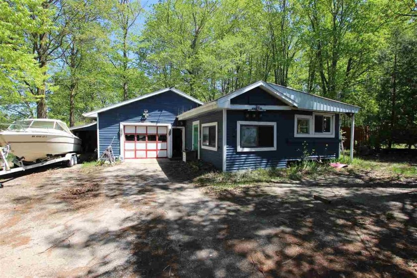 Don't miss out on this property with endless opportunities! The - Beach Home for sale in Charlevoix, Michigan on Beachhouse.com