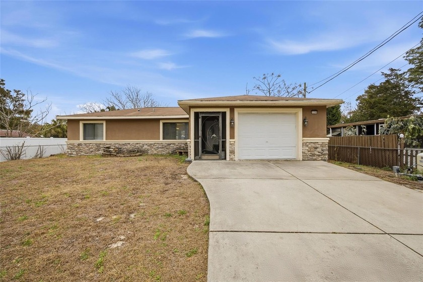 NO HOA, NO CDD! This beautifully updated 3-bed, 2-bath home in - Beach Home for sale in Spring Hill, Florida on Beachhouse.com