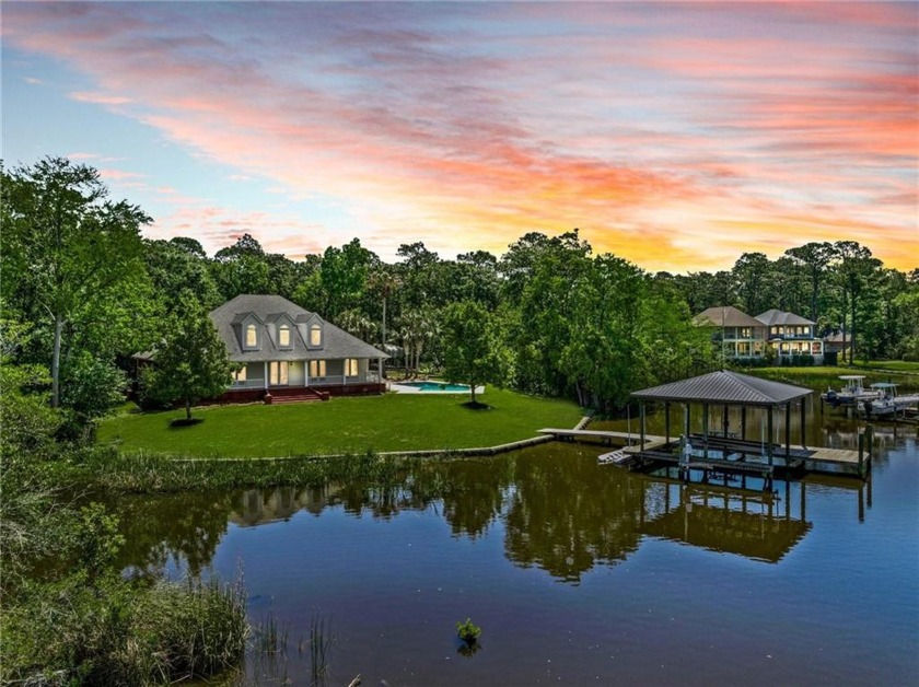 Experience the epitome of waterfront luxury in the prestigious - Beach Home for sale in Theodore, Alabama on Beachhouse.com