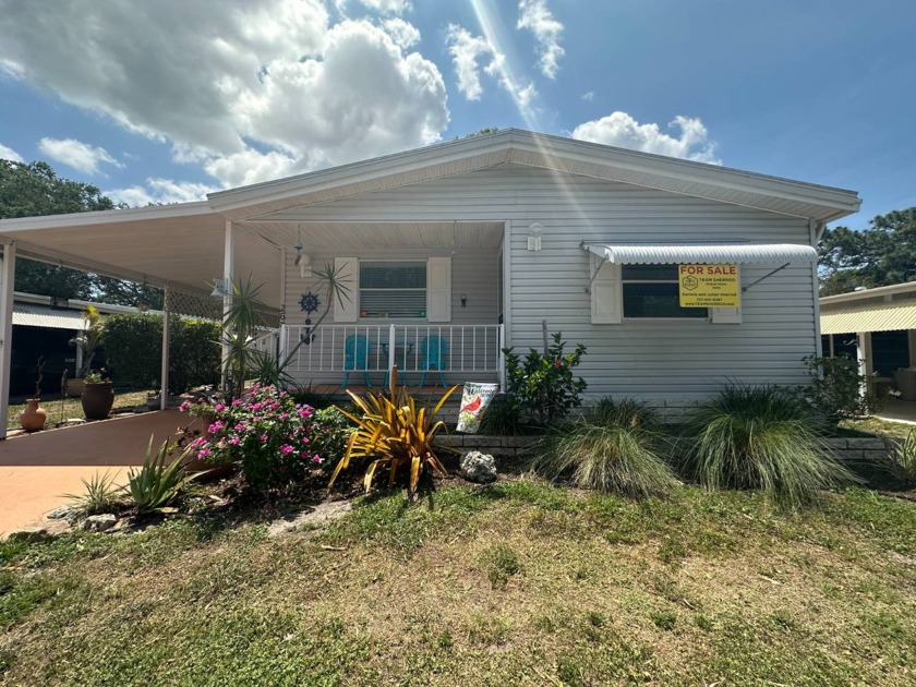 Welcome to WELCOME HOME - Down Yonder! This charming 1995 - Beach Home for sale in Largo, Florida on Beachhouse.com