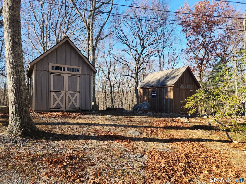 This rare private inholding offers a hilltop property defined by - Beach Home for sale in Fairfield, Connecticut on Beachhouse.com