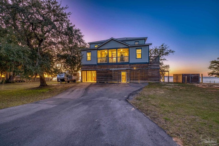 Experience coastal living at its finest in this exceptional - Beach Home for sale in Milton, Florida on Beachhouse.com