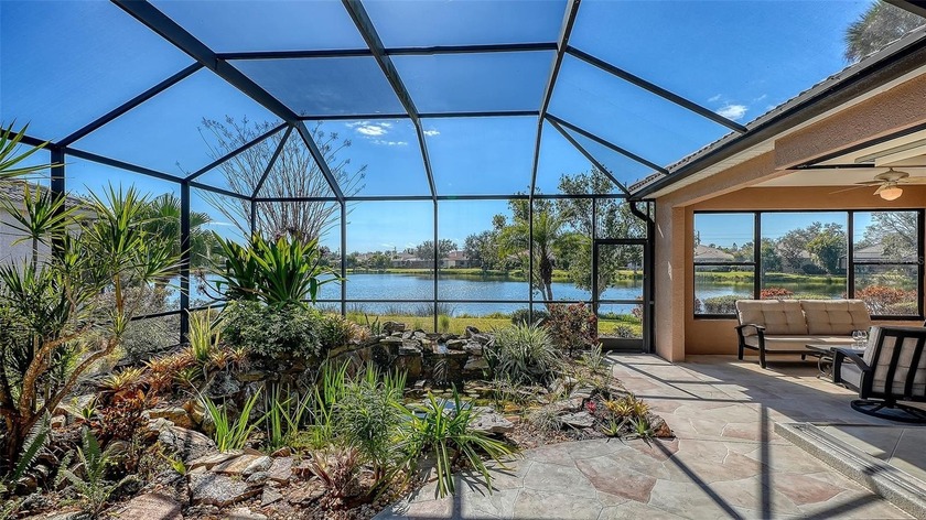 This exquisite three-bedroom, three-bath-plus-den, Lee - Beach Home for sale in Osprey, Florida on Beachhouse.com