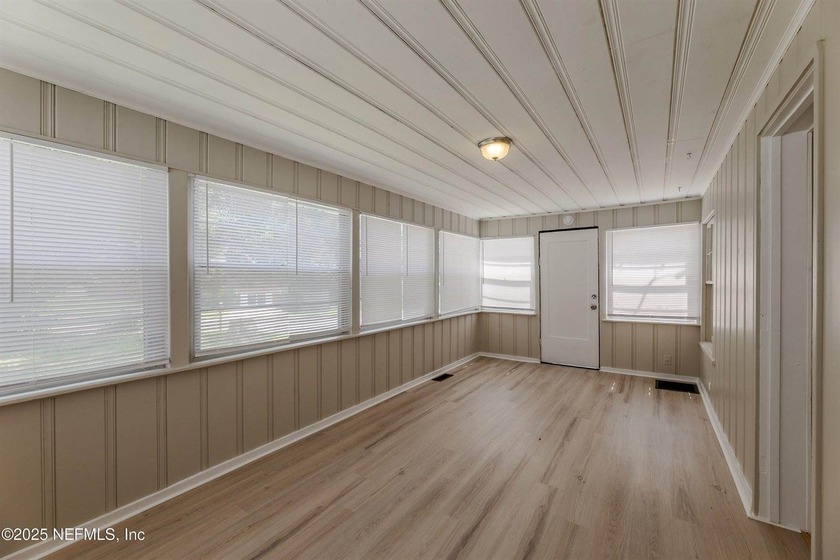 Step into a cozy three-bedroom, one-bath home with a classic - Beach Home for sale in Jacksonville, Florida on Beachhouse.com