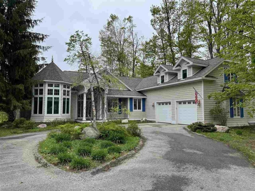 Nestled within the prestigious Birchwood Farms Golf & Country - Beach Home for sale in Harbor Springs, Michigan on Beachhouse.com