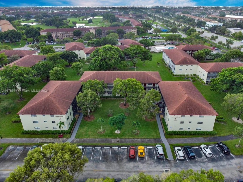 This inviting 2-bedroom, 1.5-bathroom condo on the 1st floor - Beach Condo for sale in Pembroke Pines, Florida on Beachhouse.com