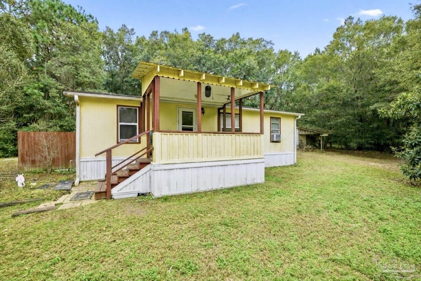 Well-maintained Milton property with a functional layout and - Beach Acreage for sale in Milton, Florida on Beachhouse.com