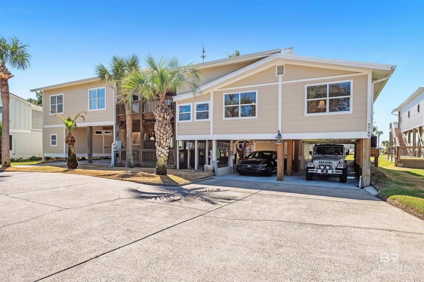 Rare Double Lot with Water Views in Bear Point Estates! This - Beach Home for sale in Orange Beach, Alabama on Beachhouse.com