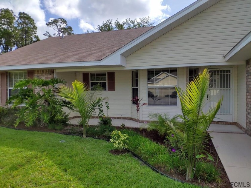 Beautiful brick home in Indian Trails. 3 bedrooms, 2 bathrooms - Beach Home for sale in Palm Coast, Florida on Beachhouse.com