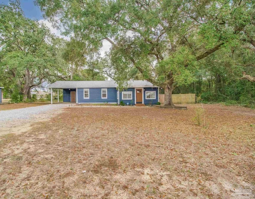 CHECK OUT THIS FULLY RENOVATED COTTAGE- Turn Key on over a 1/2 - Beach Home for sale in Milton, Florida on Beachhouse.com