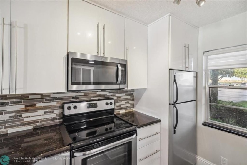 Discover this delightful 2-bedroom, 2-bathroom first-floor unit - Beach Condo for sale in Pompano Beach, Florida on Beachhouse.com