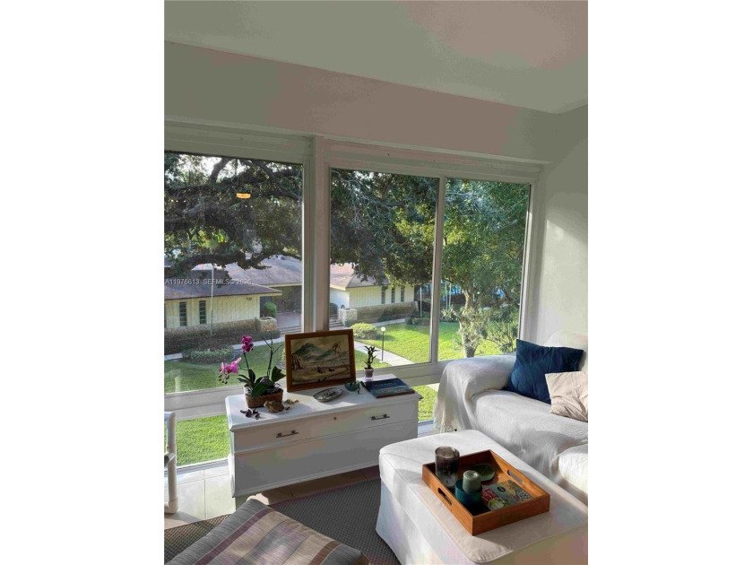 Step into a world of comfort and light in this expansive - Beach Condo for sale in Lauderdale Lakes, Florida on Beachhouse.com