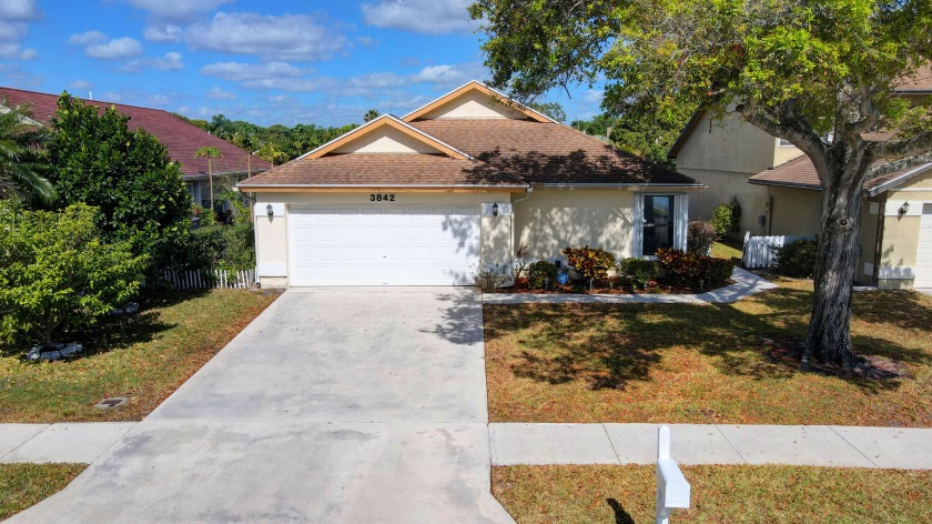 Come see this 3/2 home with a bonus room overlooking a gorgeous - Beach Home for sale in West Palm Beach, Florida on Beachhouse.com