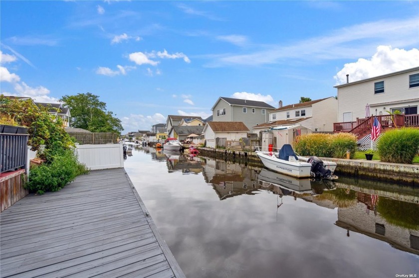 Experience Affordable Waterfront Living in this Charming - Beach Home for sale in Lindenhurst, New York on Beachhouse.com