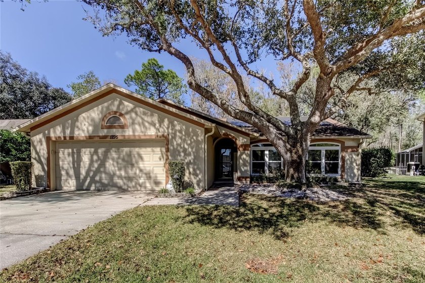 This unique home exudes character and is located on a peaceful - Beach Home for sale in Oldsmar, Florida on Beachhouse.com