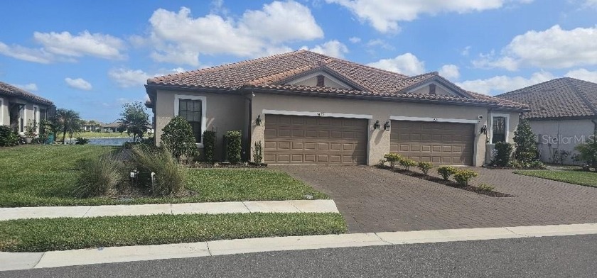 Welcome to this stunning waterfront villa in Esplanade Artesian - Beach Home for sale in Palmetto, Florida on Beachhouse.com