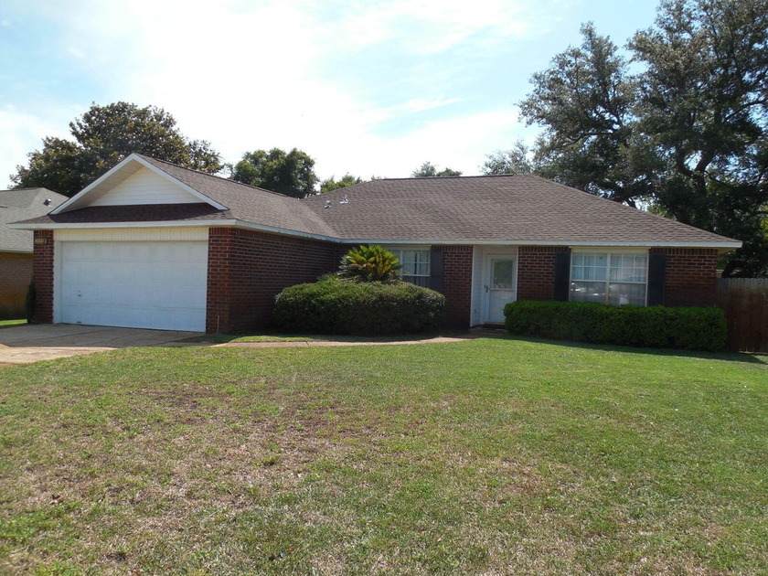 Don't miss this move in ready home nestled in a serene - Beach Home for sale in Navarre, Florida on Beachhouse.com