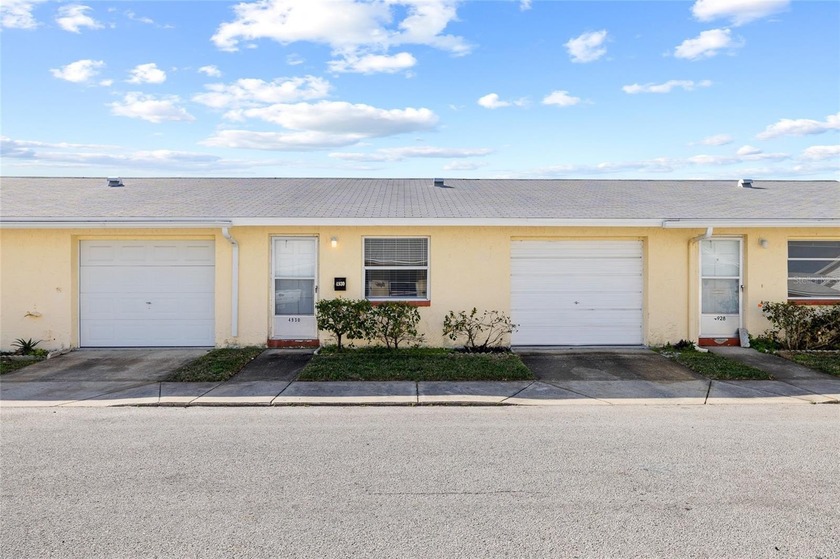 Welcome to this beautifully updated villa located in a desirable - Beach Home for sale in New Port Richey, Florida on Beachhouse.com