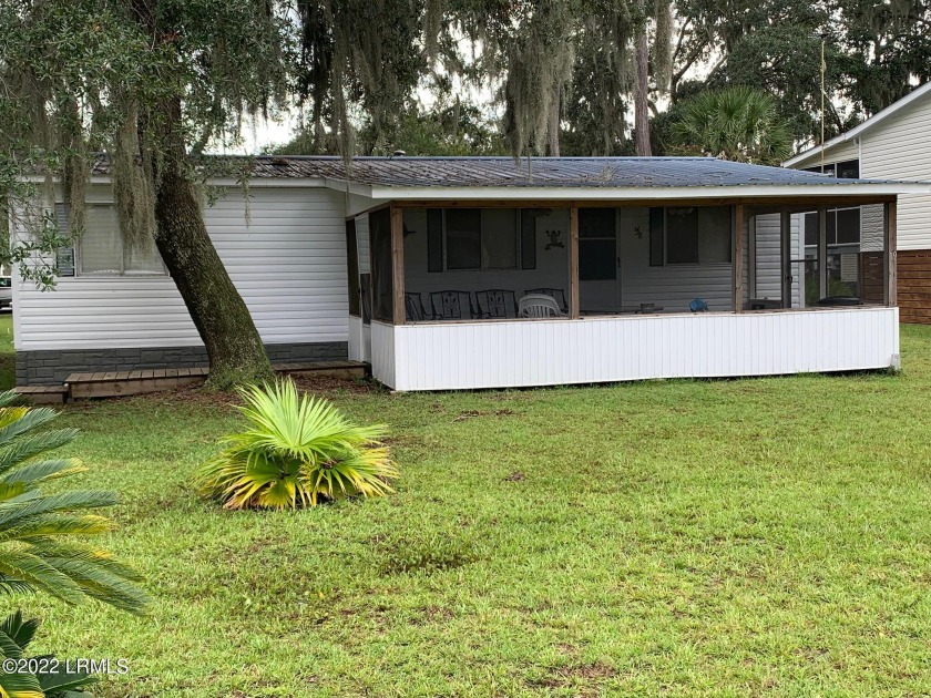 AFFORDABLE LIVING IN THIS FRIENDLY ''GOLF CART'' COMMUNITY ON - Beach Home for sale in Saint Helena Island, South Carolina on Beachhouse.com
