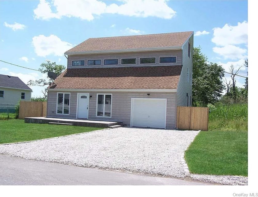 One of a Kind, Open Concept Home in Mint Condition! Only Minutes - Beach Home for sale in Mastic Beach, New York on Beachhouse.com