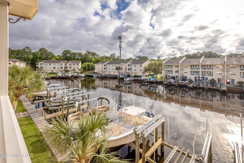 Experience waterfront luxury living at its finest in this - Beach Condo for sale in Ocean Springs, Mississippi on Beachhouse.com