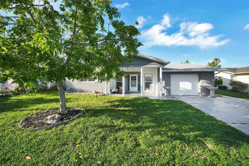 Welcome to 7118 Cherry Laurel Drive situated on a quiet street - Beach Home for sale in Port Richey, Florida on Beachhouse.com