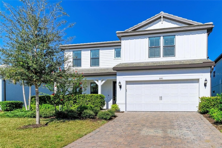 Welcome to this STUNNING and UPGRADED residence, ideally - Beach Home for sale in Bradenton, Florida on Beachhouse.com