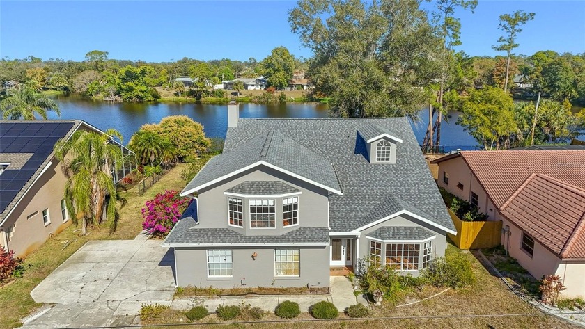Don't miss this spacious three bedroom, 2.5-bath lakefront home - Beach Home for sale in Punta Gorda, Florida on Beachhouse.com