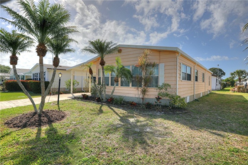 Take an easy walk over to the Pool and Lounge. This fully - Beach Home for sale in Barefoot Bay, Florida on Beachhouse.com