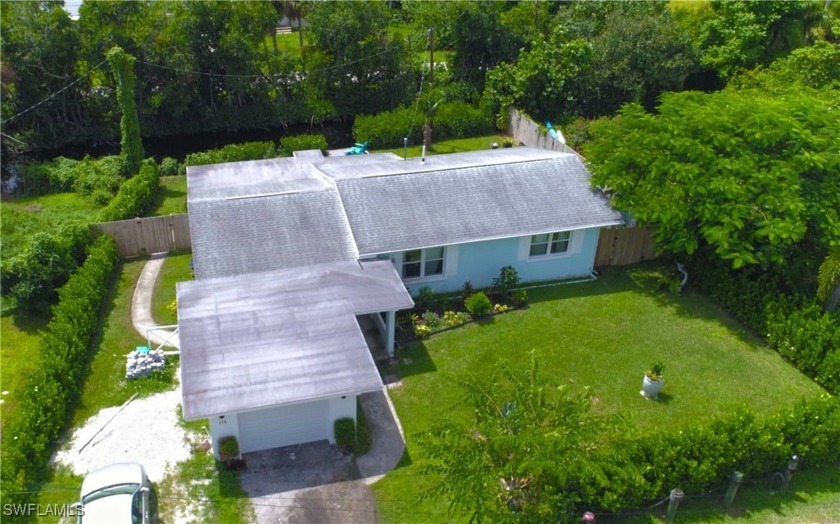 This beautiful renovated 3 bedroom waterfront property sits on a - Beach Home for sale in North Fort Myers, Florida on Beachhouse.com