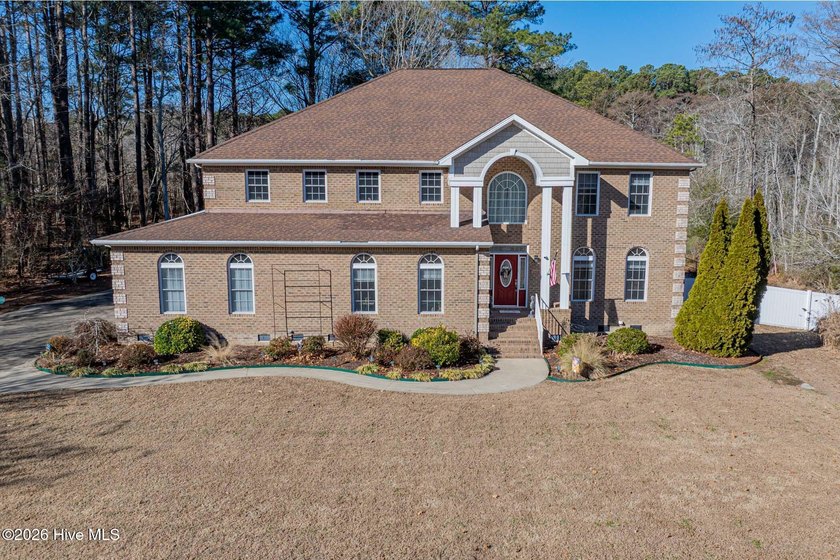 Fall in love with this canal-front estate on a rare 1.35-acre - Beach Home for sale in Elizabeth City, North Carolina on Beachhouse.com