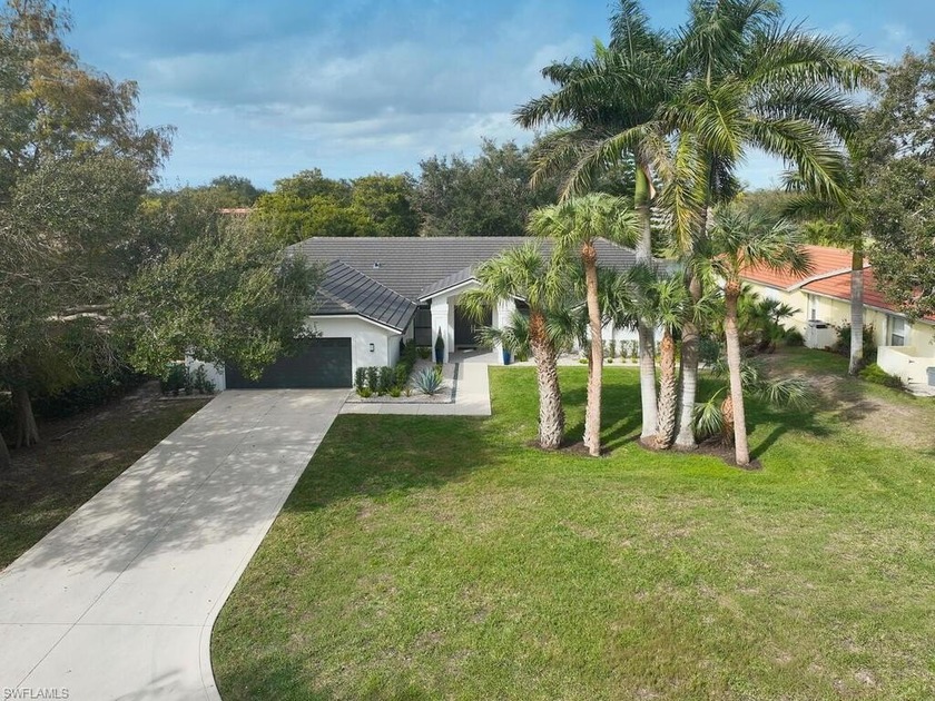 Golden sunsets, tranquil lake views, and a coveted Monterey - Beach Home for sale in Naples, Florida on Beachhouse.com