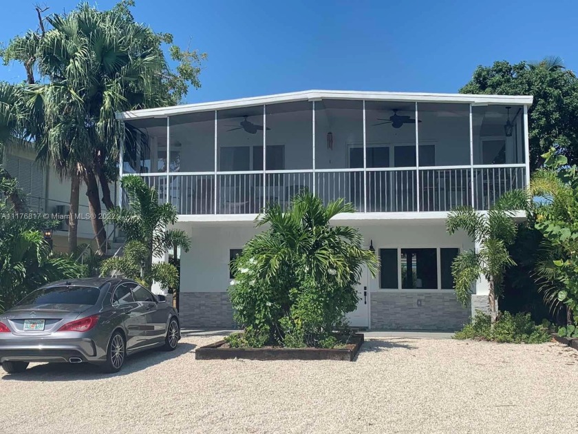WATERVIEWS -MUST SEE! WEEKLY RENTALS ALLOWED! Tranquility awaits - Beach Home for sale in Key Largo, Florida on Beachhouse.com