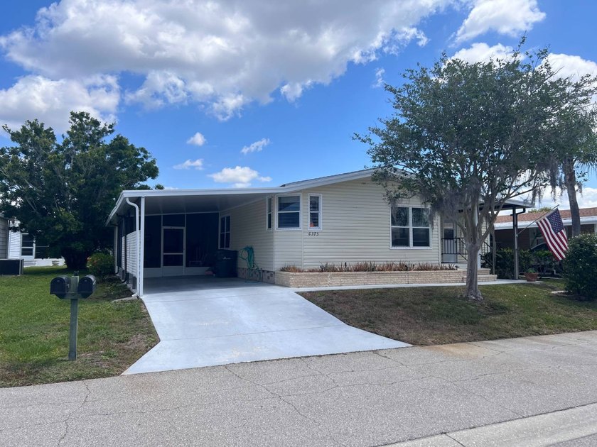 Approximately 1,600 sq. ft. under air, this move-in ready home - Beach Home for sale in Sarasota, Florida on Beachhouse.com
