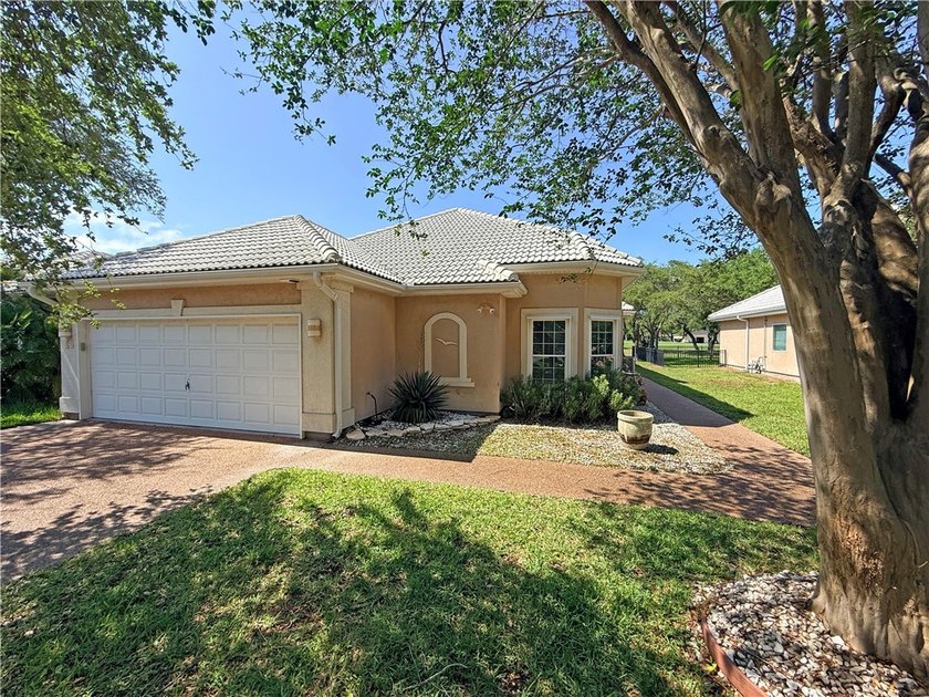 Tucked within the Rockport Country Club, this stunning patio - Beach Home for sale in Rockport, Texas on Beachhouse.com
