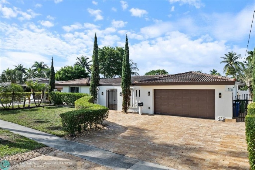 This gorgeous home has updated baths and updated large eat-in - Beach Home for sale in Fort Lauderdale, Florida on Beachhouse.com