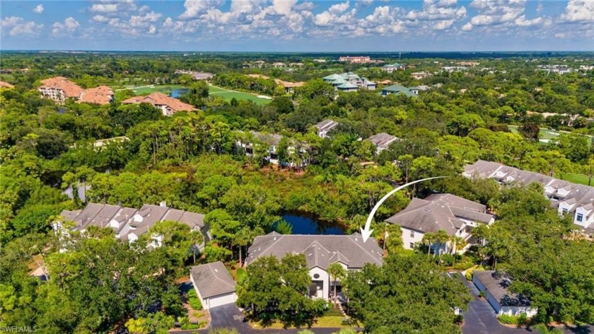 Tucked away in the coveted Oakwood Carriage Homes of Bonita Bay - Beach Home for sale in Bonita Springs, Florida on Beachhouse.com