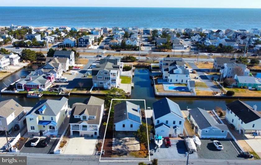 Beautiful canal front cottage with a private boat dock, located - Beach Home for sale in South Bethany, Delaware on Beachhouse.com