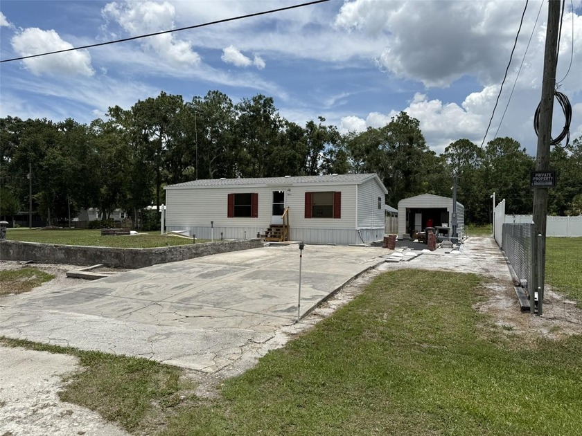 Amazing country living property! 2004 doublewide, meticulously - Beach Home for sale in New Port Richey, Florida on Beachhouse.com