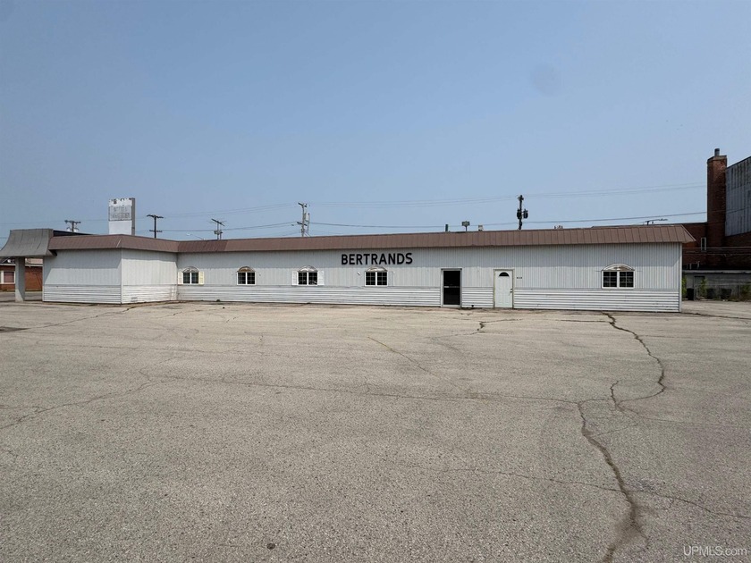 Unlock the perfect investment opportunity with this commercial - Beach Commercial for sale in Escanaba, Michigan on Beachhouse.com