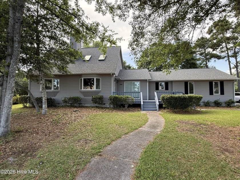Welcome to 206 Spruce Drive, located in the gated golf course - Beach Home for sale in Morehead City, North Carolina on Beachhouse.com
