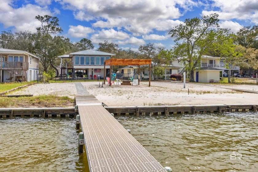 Charming Bayfront home in Bear Point, Orange Beach! Welcome to - Beach Home for sale in Orange Beach, Alabama on Beachhouse.com