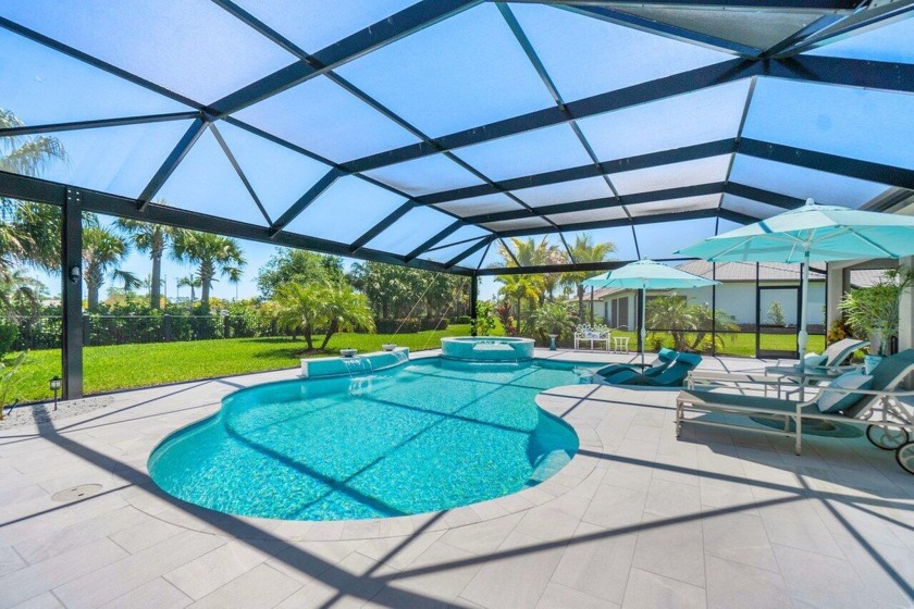 Welcome to your dream oasis in the private, gated community of - Beach Home for sale in Palm Beach Gardens, Florida on Beachhouse.com