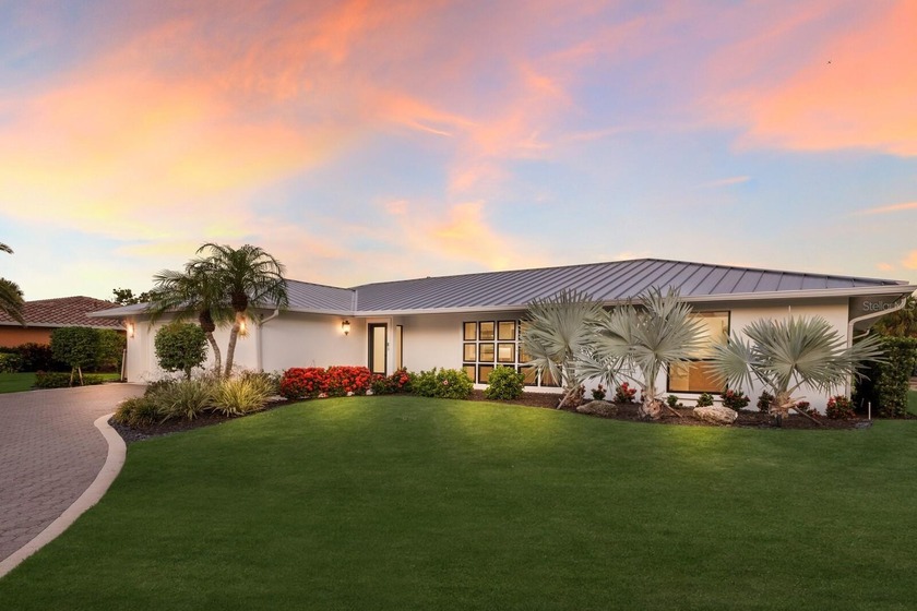 Welcome to 510 Putter Lane, a stunning canal-front retreat - Beach Home for sale in Longboat Key, Florida on Beachhouse.com