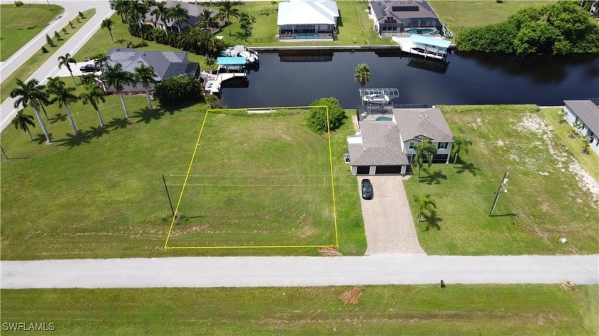 SEAWALL IN PLACE WITH A CONCRETE SITTING AREA. NW Cape Coral - Beach Lot for sale in Cape Coral, Florida on Beachhouse.com