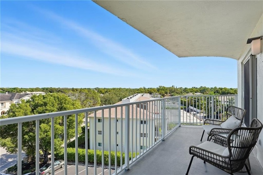 Just steps from Naples' white-sand beaches, this beautifully - Beach Home for sale in Naples, Florida on Beachhouse.com