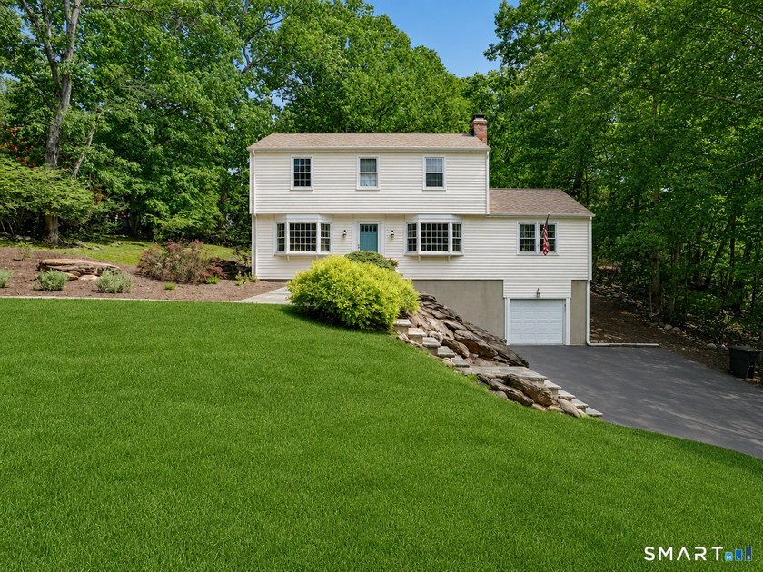 Set on a beautiful hilltop lot in the desirable Lake Hills - Beach Home for sale in Fairfield, Connecticut on Beachhouse.com