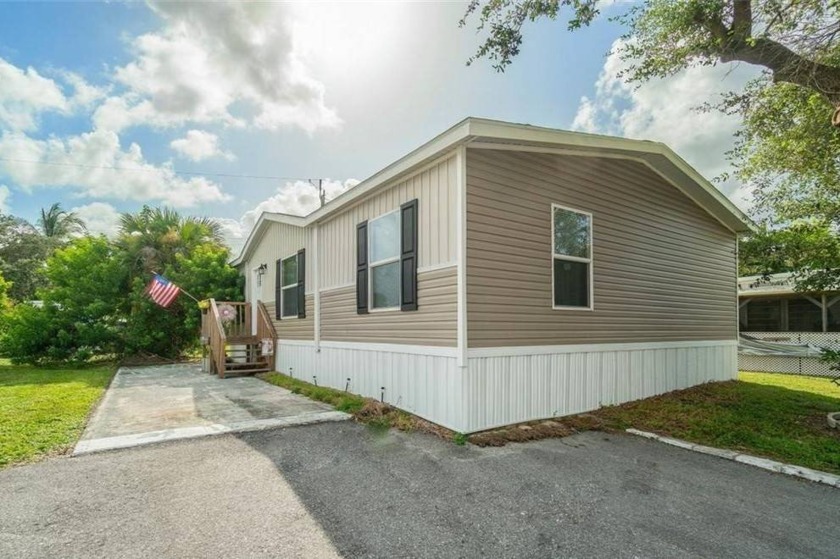 This 2022 home has all the trimmings inside for a surprisingly - Beach Home for sale in Lake Worth Beach, Florida on Beachhouse.com